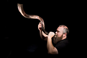 Blowing a shofar